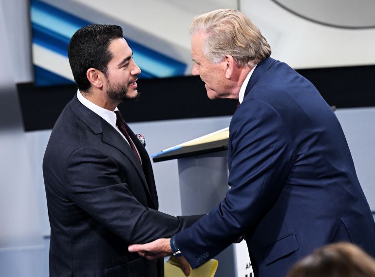 afp_6ada1ffbd133-1792679931 SOUTHFIELD, MICHIGAN - OCTOBER 21: U.S. Senate candidates Democrat Abdul El-Sayed, left, and Michigan Republican Senate candidate, former U.S. Rep. Mike Rogers (R-MI) shake hands after the debate on October 21, 2026 at WXYZ Channel 7 in Southfield, Michigan. Robin Buckson-Pool/Getty Images/AFP (Photo by POOL / GETTY IMAGES NORTH AMERICA / Getty Images via AFP)