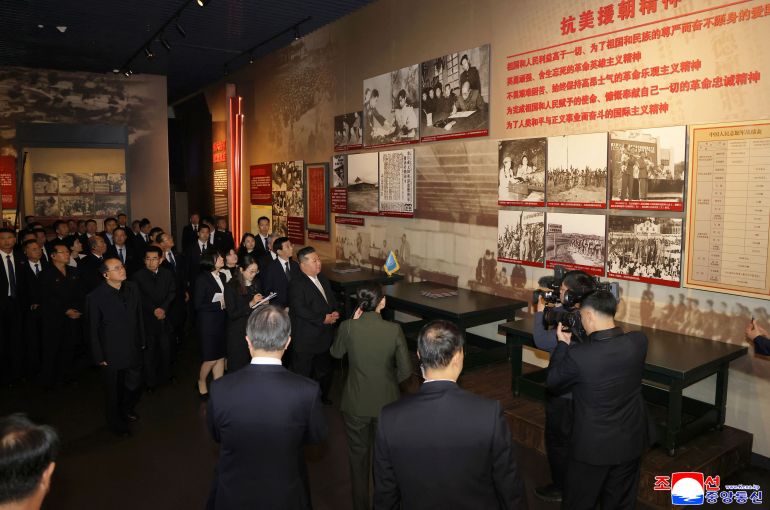 This picture taken on October 24, 2026 and released by North Korea's official Korean Central News Agency (KCNA) on October 25, 2026 shows North Korean leader Kim Jong Un (C) visiting the Memorial Hall of the War to Resist US Aggression and Aid Korea in Dandong, China's Liaoning province.
