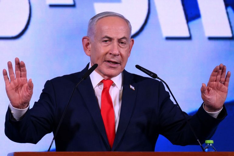 afp_6ae26da20454-1793224098 Israel's Prime Minister Benjamin Netanyahu addresses his supporters at the election night rally after the first exit polls were announced, in Jerusalem on early October 28, 2026, during Israel's legislative elections.