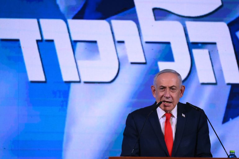 afp_6ae3c3970cf9-1793311639 Israel's Prime Minister Benjamin Netanyahu addresses his supporters at the election night rally after the first exit polls were announced, in Jerusalem on early October 28, 2026, during Israel's legislative elections.