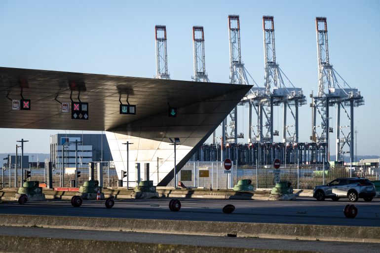 afp_6ae4adf49249-1793371636 This photograph shows the empty entrance of the industrial port of Le Havre, nothwestern France, on October 30, 2026, as dockworkers stage a 24-hour strike to protest against the government's budget.