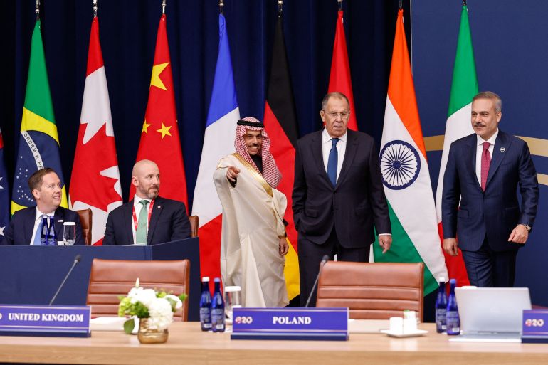 afp_6ae4d9f43379-1793382900 Russia's Foreign Minister Sergey Lavrov (2R), alongside Saudi Arabia's Foreign Minister Faisal bin Farhan (3L) and Turkey's Foreign Minister Hakan Fidan (R), arrives for the first plenary session at the G20 foreign ministers' meeting in Atlanta, Georgia on October 30, 2026.