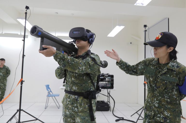 Soldiers perform operating Stinger Missile System Training Simulator during a media event in Tainan, Southern Taiwan, Tuesday, Sept. 22, 2026. (AP Photo/Chiang Ying-ying)