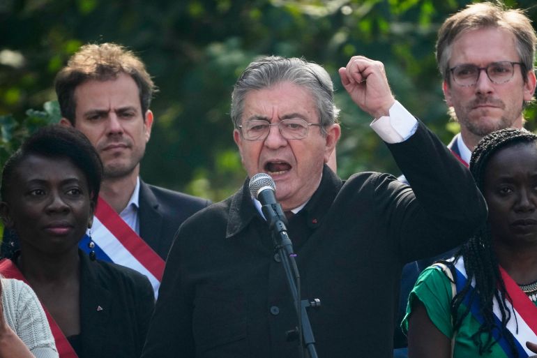 ap_6abffc7f9dad8-1790966911 French far-left leader Jean-Luc Melenchon attends a demonstration in protest of the government's release of next year's draft budget, in Paris, Tuesday, Sept. 29, 2026. (AP Photo/Teresa Suarez)