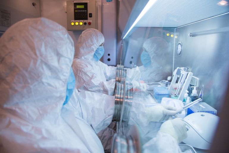 This undated photo released in 2019 by the Irkutsk Anti-Plague Research Institute of Siberia and Far East, shows the institute workers in a lab. (The Irkutsk Anti-Plague Research Institute of Siberia and Far East via AP) ADDITION: adding photo was released in 2019