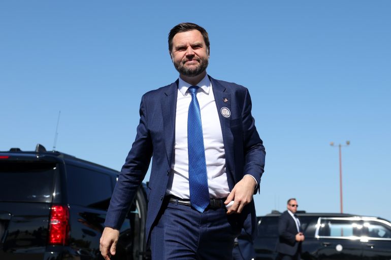 ap_6ac933d413ef0-1791570900 Vice President JD Vance walks to speak to members of the media at Cincinnati/Northern Kentucky International Airport, Friday, Oct. 9, 2026, in Hebron, Ky., as he departs for a rally in Lima, Ohio. (Samuel Corum/Pool Photo via AP)