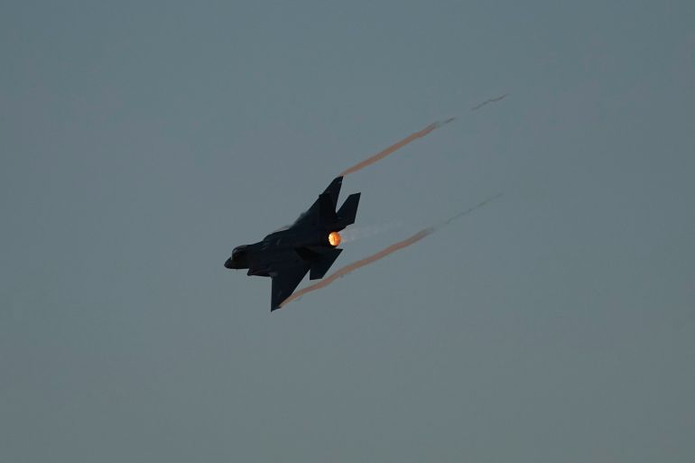 An Israeli air force F-35 war plane flies over during a graduation ceremony for new pilots in Hatzerim air force base near the southern Israeli city of Beersheba, Israel, Thursday, June 29, 2023. (AP Photo/Tsafrir Abayov)