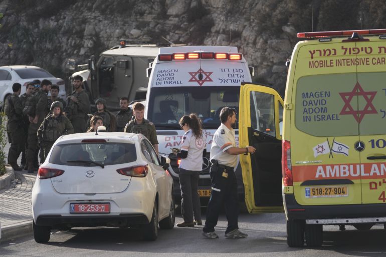 ap_6adaf90cb53d9-1792735500 Israeli soldiers and emergency personnel gather near ambulances following a shooting attack near Yehuda Junction, near Hebron, in the occupied West Bank, Friday, Oct. 23, 2026. (AP Photo/Mahmoud Illean)