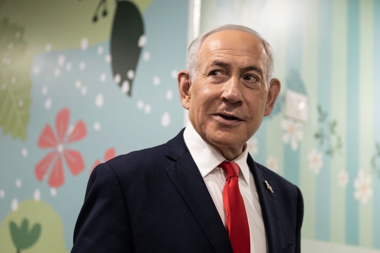 ap_6ae0c3cd8284c-1793115085 Israel's Prime Minister Benjamin Netanyahu arrives to speak to the media after voting at a polling station in Jerusalem, Tuesday, Oct. 27, 2026. (Jewel Samad/Pool Photo via AP)