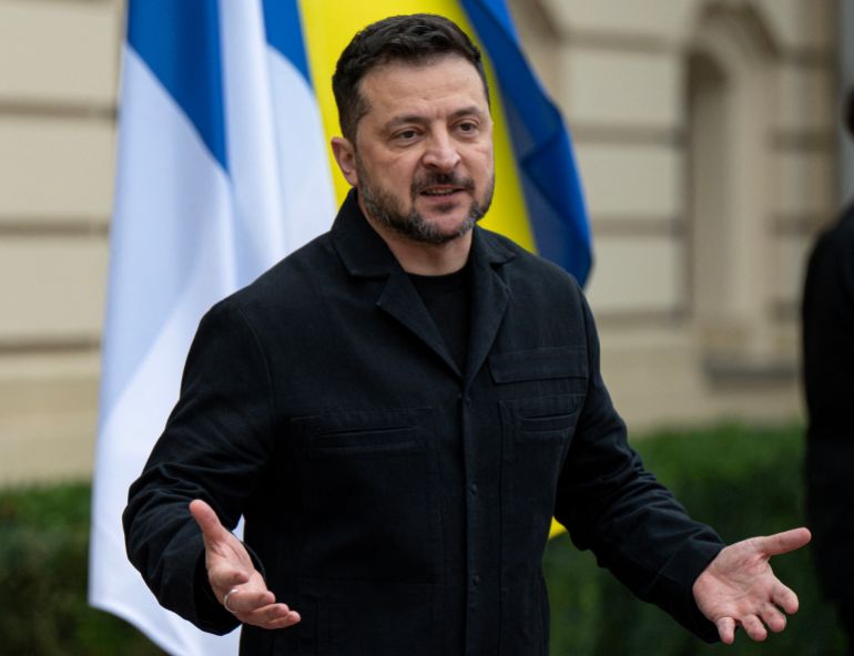 Ukraine's President Volodymyr Zelensky gestures as he addresses the media ahead of his meeting with Finland's Prime Minister in Kyiv on October 22, 2026, amid the Russian invasion of Ukraine. (Photo by Genya SAVILOV / AFP)