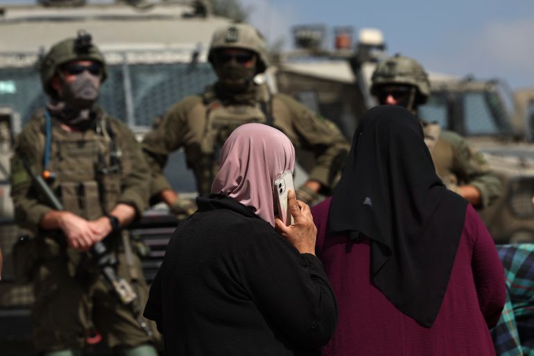 epa_6acd13794c77-1791824761 epa13292005 Israeli army and settlers block Palestinian women from reaching their archers to harvest their olive trees, in the West Bank town of Birzeit, 09 October 2026. The olive harvest season in Birzeit which serves as a critical economic pillar and a festive community event has increasingly become a major flashpoint due to tight restrictions and regional violence. EPA/ATEF SAFADI