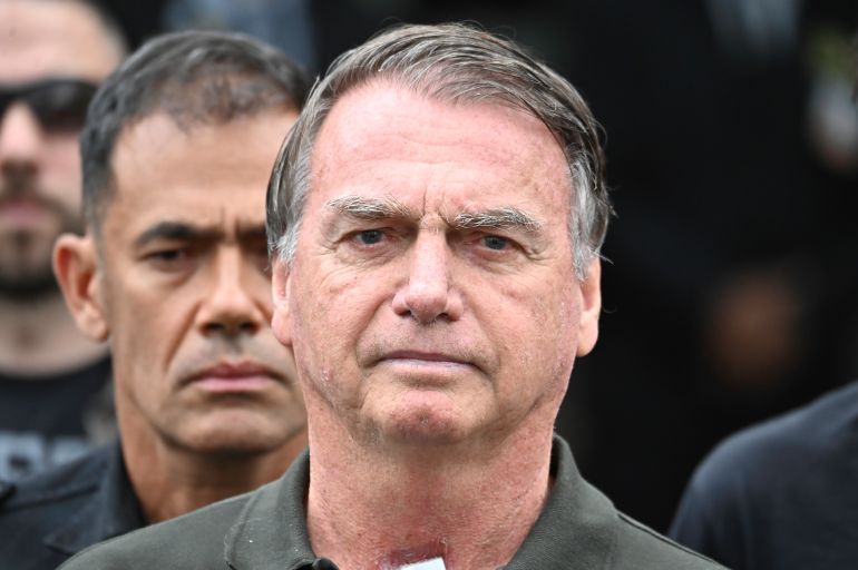 getty_69266a4f6b-1764125263 BRASILIA, BRAZIL - SEPTEMBER 14: Former Brazilian President Jair Bolsonaro leaves DF Star Hospital after undergoing a medical procedure on September 14, 2025, in Brasília, Brazil. Bolsonaro ruled the country from 2019 to 2022 and was sentenced to 27 years in prison for a coup plot after his defeat to Lula da Silva in the 2022 presidential election. The right-wing former president also faces four additional charges related to attacks on democratic order. (Photo by Ton Molina/Getty Images)