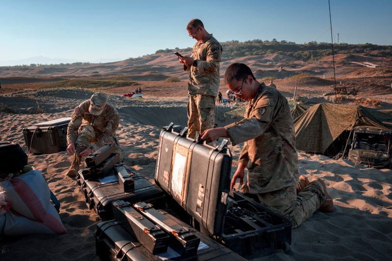getty_6abde6b957-1790830265 LAOAG, PHILIPPINES - MAY 04: U.S. troops prepare to deploy a drone during a counter-landing live fire exercise as part of the annual Balikatan joint military drills on May 04, 2026 in Laoag, Ilocos Norte province, Philippines. The expanded exercises, now involving more than 17,000 troops from multiple allied nations, come amid rising tensions in the South China Sea and as Washington faces overlapping security demands due to the ongoing war with Iran. This year marks the first time Japanese Self-Defense Forces have taken part in combat drills on Philippine soil, signaling a significant shift in Japan’s post-war defense posture and deepening regional security ties. (Photo by Ezra Acayan/Getty Images)