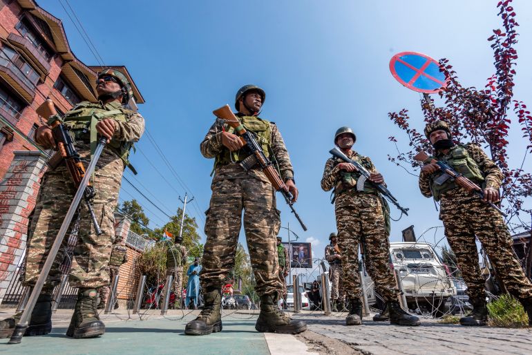 getty_6aca852015-1791657248 SRINAGAR, INDIA - OCTOBER 10: Indian paramilitary soldiers stand alert outside the Congress office as opposition party members tried to march on roads during a protest organised by the INDIA bloc at the Congress office on October 10, 2026 in Srinagar, India.Opposition figures and activists gathered to demand the resignation of India's Chief Election Commissioner, Gyanesh Kumar, over what they say are alleged irregularities in electoral processes and the revision of voter rolls. (Photo by Yawar Nazir/Getty Images)