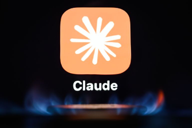 getty_6acb8f79b6-1791725433-1 LONDON, ENGLAND - SEPTEMBER 16: In this photo illustration, the icon for the AI app "Claude" by Anthropic is seen through a flame as it is displayed on a digital screen on September 16, 2026 in London, England. (Photo by Leon Neal/Getty Images)