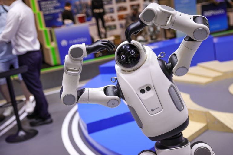 BERLIN, GERMANY - SEPTEMBER 8: A humanoid robot by DOBOT makes a heart shape with it's hands, at the 2026 IFA consumer electronics and appliances trade fair on September 8, 2026 in Berlin, Germany. This year's IFA includes the integration of artificial intelligence (AI) into a wide range of products. (Photo by Omer Messinger/Getty Images)