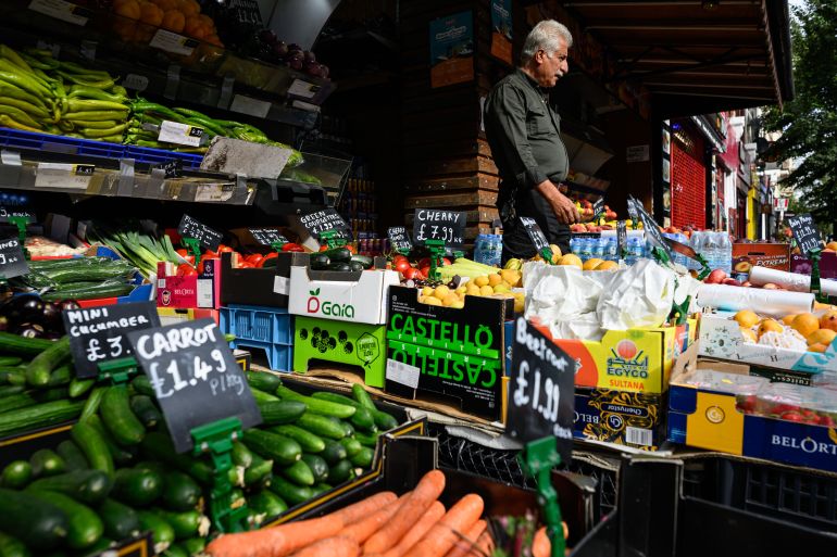 getty_6add060e53-1792869902 LONDON, ENGLAND - AUGUST 05: The store owner walks past the fresh fruit and vegetables as they are displayed outside the "Turkish Food Market" grocers on August 05, 2026 in London, England. The UK's National Farmers' Union (NFU) has warned that Britain could face food shortages amid record low rainfall and exceptionally high temperatures this growing season. Half of England and all of Wales have been officially declared in drought, as a fourth heatwave takes its toll on parts of the country. The NFU has urged the government to offer farmers tax breaks to build water storage systems to help cope with water supply shortages. Meanwhile, supermarket bosses have called for Prime Minister Andy Burnham to urgently introduce a "Good Food Bill" aimed at improving the UK's food security, as Britain and Europe face the challenges of an increasingly hotter and drier climate for food production. (Photo by Leon Neal/Getty Images)