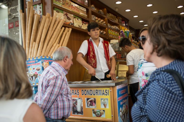 gettyimages-529265380-1791645429 Dondurma sellers on Istiklal Cad work to amuse patients who buy their sticky ice cream. (Photo by Monique Jaques/Corbis via Getty Images)
