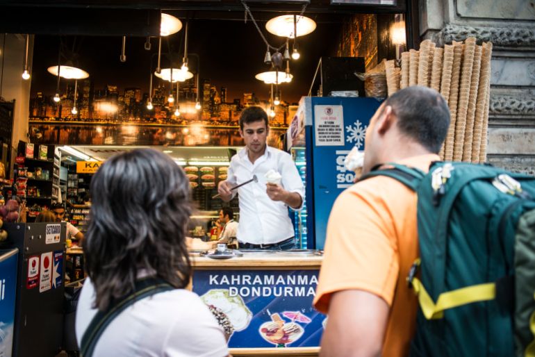 gettyimages-529265434-1791645424 Dondurma sellers on Istiklal Cad work to amuse patients who buy their sticky ice cream. (Photo by Monique Jaques/Corbis via Getty Images)