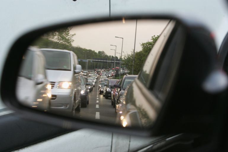 gettyimages-80933486-1790696918 BERLIN - APRIL 30: Traffic jam is reflecting in a driving mirror on the airport access road due a bus strike of Berlin's public transport on April 30, 2008 in Berlin, Germany. The bus drivers, represented by the ver.di labour union, are now in an unlimited strike in an effort to put pressure on management to agree to higher pay. Commuter and underground train services are not currently affected but could join the strike if negotiations make no headway. (Photo by Andreas Rentz/Getty Images)