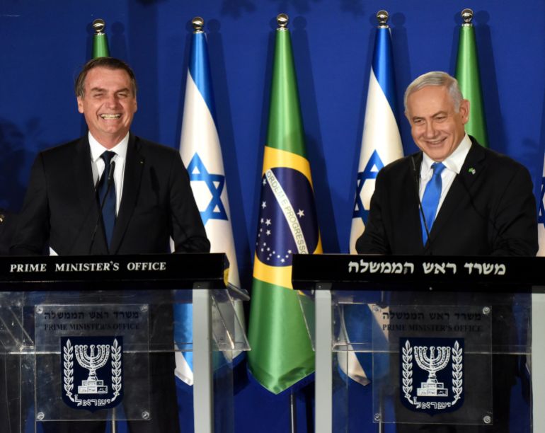 pic-366188774412-1791571323 Israeli Prime Minister Benjamin Netanyahu and Brazilian President Jair Bolsonaro smile as they deliver joint statements in Jerusalem March 31, 2019. Debbie Hill/Pool via REUTERS TPX IMAGES OF THE DAY