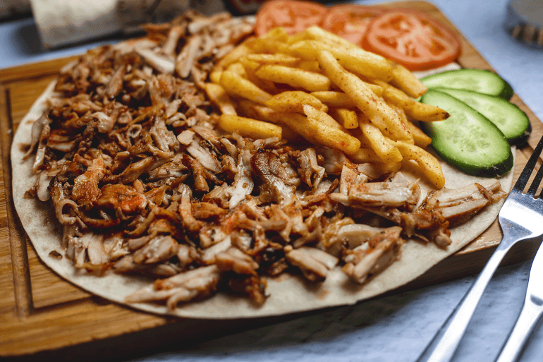 pic-889846-1790883090 side-view-doner-pita-with-french-fries-fresh-cucumber-tomato المصدر: فريبيك دونر شاوما Shawerma Doner meat-doner-cook المصدر: فريبيك