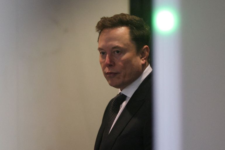 reuters_6a65e4a8-1785062568 FILE PHOTO: Elon Musk walks to attend the trial in his lawsuit over OpenAI for-profit conversion at a federal courthouse, in Oakland, California, U.S., April 29, 2026. REUTERS/Manuel Orbegozo/File Photo