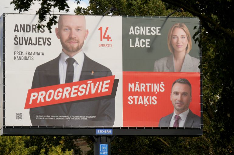 reuters_6ac02aa0-1790978720 FILE PHOTO: An election campaign poster of the "Progressives" party is pictured before the general election in Riga, Latvia, September 27, 2026. REUTERS/Ints Kalnins/File Photo