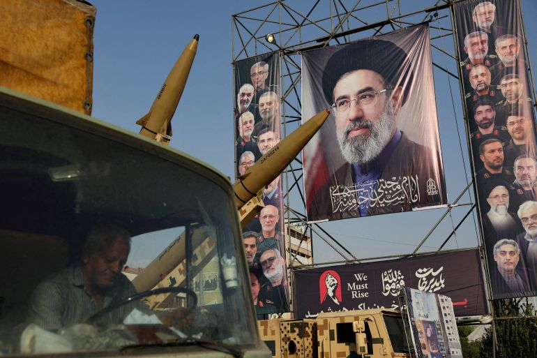 FILE PHOTO: Iranian missiles are displayed next to a banner with a picture of Iran's Supreme Leader, Mojtaba Khamenei, on a street in Tehran, Iran, September 27, 2026. Majid Asgaripour/WANA (West Asia News Agency) via REUTERS ATTENTION EDITORS - THIS PICTURE WAS PROVIDED BY A THIRD PARTY. ISRAEL OUT. NO COMMERCIAL OR EDITORIAL SALES IN ISRAEL. NO ACCESS FOR ISRAELI MEDIA. NO USE BBC PERSIAN. NO USE VOA PERSIAN. NO USE MANOTO. NO USE IRAN INTERNATIONAL. NO USE RADIO FARDA. DIGITAL: NO USE BBC PERSIAN. NO USE VOA PERSIAN. NO USE MANOTO. NO USE IRAN INTERNATIONAL. NO USE RADIO FARDA./File Photo