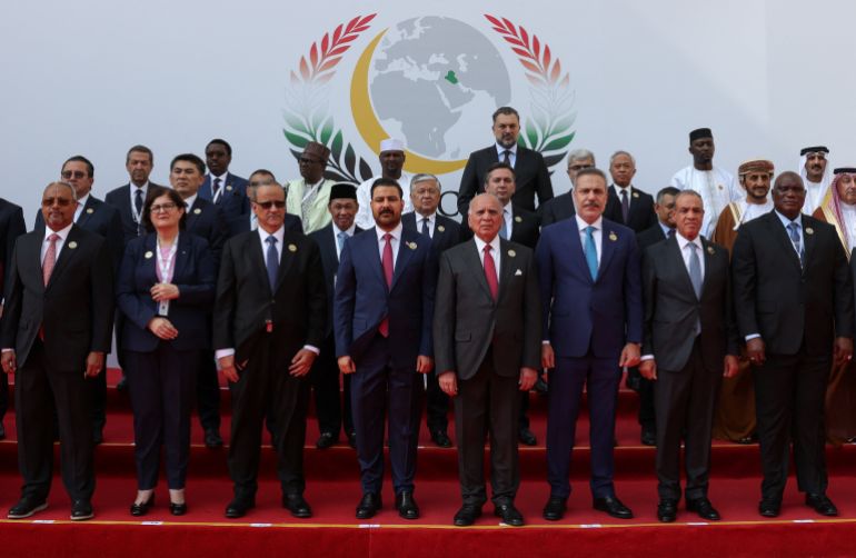 reuters_6ad397fb-1792251899 Iraq's Prime Minister Ali al-Zaidi, Foreign Minister Fuad Hussein, Organization of Islamic Cooperation (OIC) Secretary-General Ismail Ould Cheikh Ahmed pose with delegates for a family photo on the day of the opening session of the 52nd Council of Foreign Ministers of the Organization of Islamic Cooperation (OIC) in Baghdad, Iraq, October 17, 2026. REUTERS/Ahmed Saad