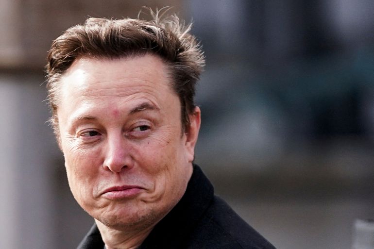reuters_6ad4965e-1792317023 FILE PHOTO: Elon Musk reacts, on the day he meets with Indian Prime Minister Narendra Modi at Blair House, in Washington, D.C., U.S., February 13, 2025. REUTERS/Nathan Howard/File Photo