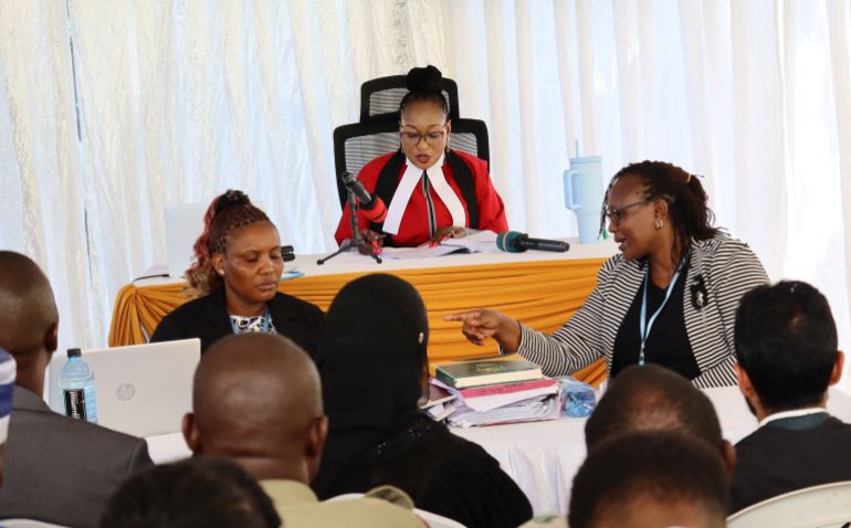 reuters_6ad646a8-1792427688 High Court Judge Diana Kavedza Mochache delivers the judgment on Paul Mackenzie, a Kenyan cult leader accused of ordering his followers, members of the Good News International Church to starve themselves to death in Shakahola Forest, at the Mombasa High Court, Kenya October 19, 2026. REUTERS/Laban Walloga