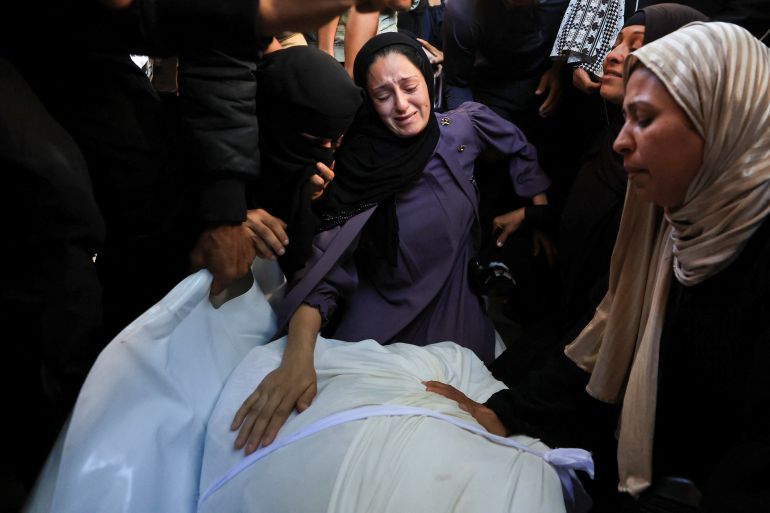 reuters_6ad8a82f-1792583727 Mourners react during the funeral of Palestinian Tamer Al-Sabagh, who was killed in an Israeli strike yesterday, in Gaza City, October 20, 2026. REUTERS/Dawoud Abu Alkas