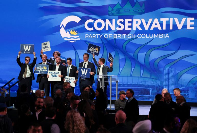 reuters_6ade1420-1792939040 Supporters gather on stage, following local media projections of a Conservative majority government, at the provincial election night party of BC Conservative Party interim leader Lorne Doerkson in Vancouver, British Columbia, Canada, October 24, 2026. REUTERS/Chris Helgren