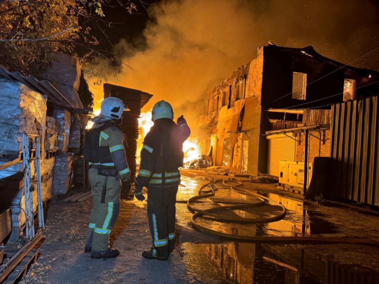 reuters_6ae19a19-1793169945 Firefighters work at the site of a Russian drone strike, amid Russia's attack on Ukraine, in Kharkiv, Ukraine, October 27, 2026. Picture taken with a mobile phone. REUTERS/Vitalii Hnidyi