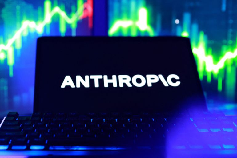 Anthropic logo and stock graphs in this illustration taken on October 26, 2026. REUTERS/Dado Ruvic/Illustration