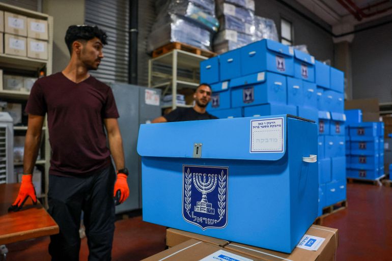 reuters_6ae23f46-1793212230-1 Workers prepare ballot boxes for distribution, at the Israeli Central Elections Commission warehouse, ahead of Israel's national election, in Shoham, Israel, October 14, 2026. REUTERS/Ronen Zvulun TPX IMAGES OF THE DAY