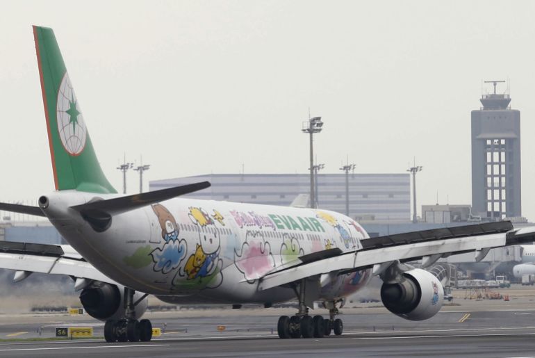 An Airbus aircraft of Taiwan's Eva Airlines, owned by the Evergreen Group and decorated with Hello Kitty motifs, is seen at Taoyuan International Airport, northern Taiwan, March 14, 2016. REUTERS/Tyrone Siu
